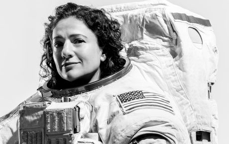 Jessica Meir ’99 poses in her spacesuit